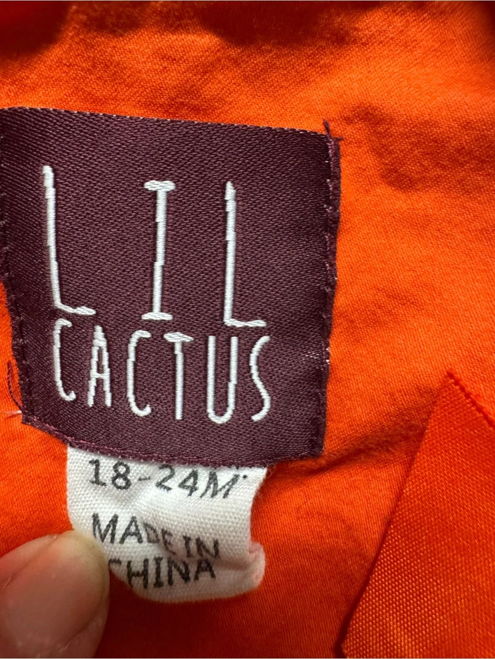 vintage-style corduroy longall romper from the children's brand Lil Cactus.
